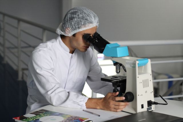 A boy using the scientific method in the laboratory.